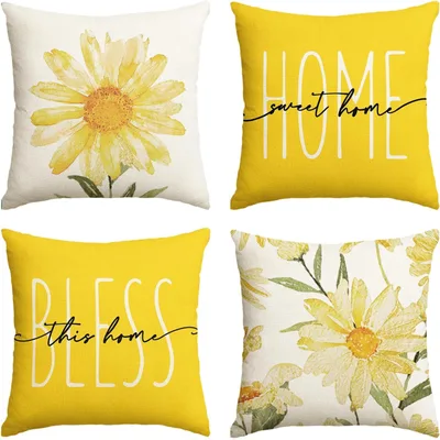Amazon product photo: AVOIN set of four yellow and floral throw pillow covers